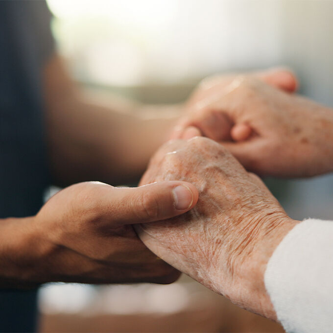 two people holding hands